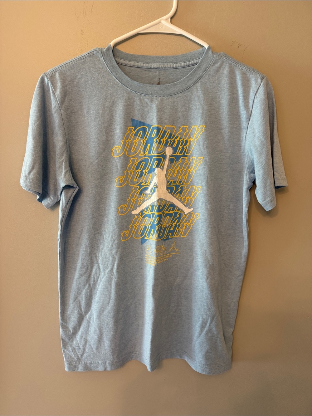 Jordan Light Blue Tee with Yellow Script and White Jumpman